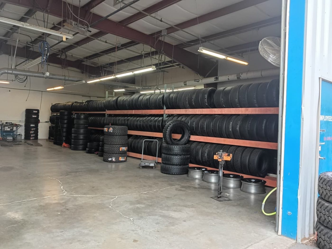 Tire racks inside the Hillsboro service bay